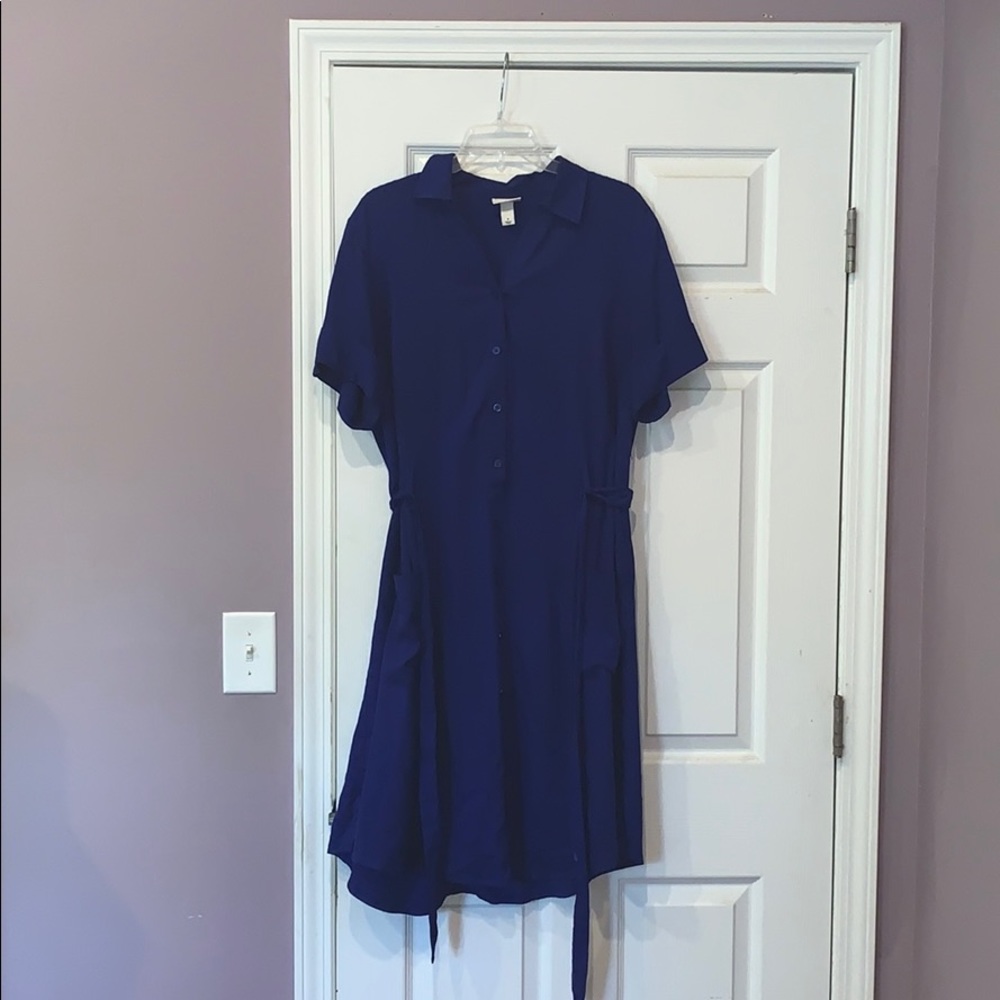 Classy blue button up dress.